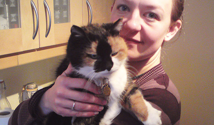 Sheppy, older cat and her owner