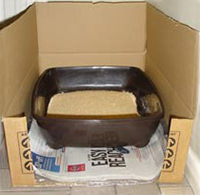 litter tray in a 3 sided box